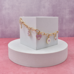PULSERA CON CHARMS LILA
