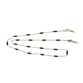 CADENA DE LENTES Y CUBRE BOCAS DORADO CON PIEDRAS NEGRAS