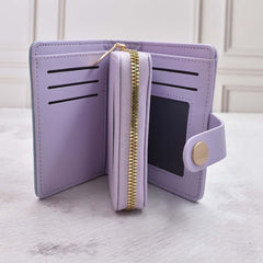 CARTERA MONEDERO BI COLOR CON TRES COMPARTIMIENTOS INTERIOR MORADO